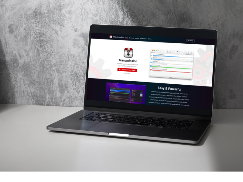 Transmission Torrent client running on a Mac Laptop (sitting on a desk)